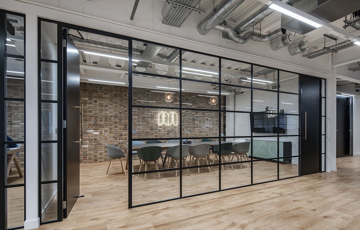Black steel and glass partition for a conference room